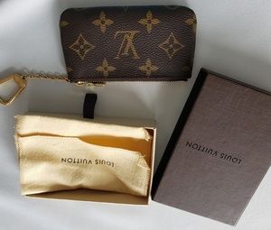 Louis vuitton coin purse never been used